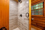 Main Level Bathroom with Walk In Tile Shower